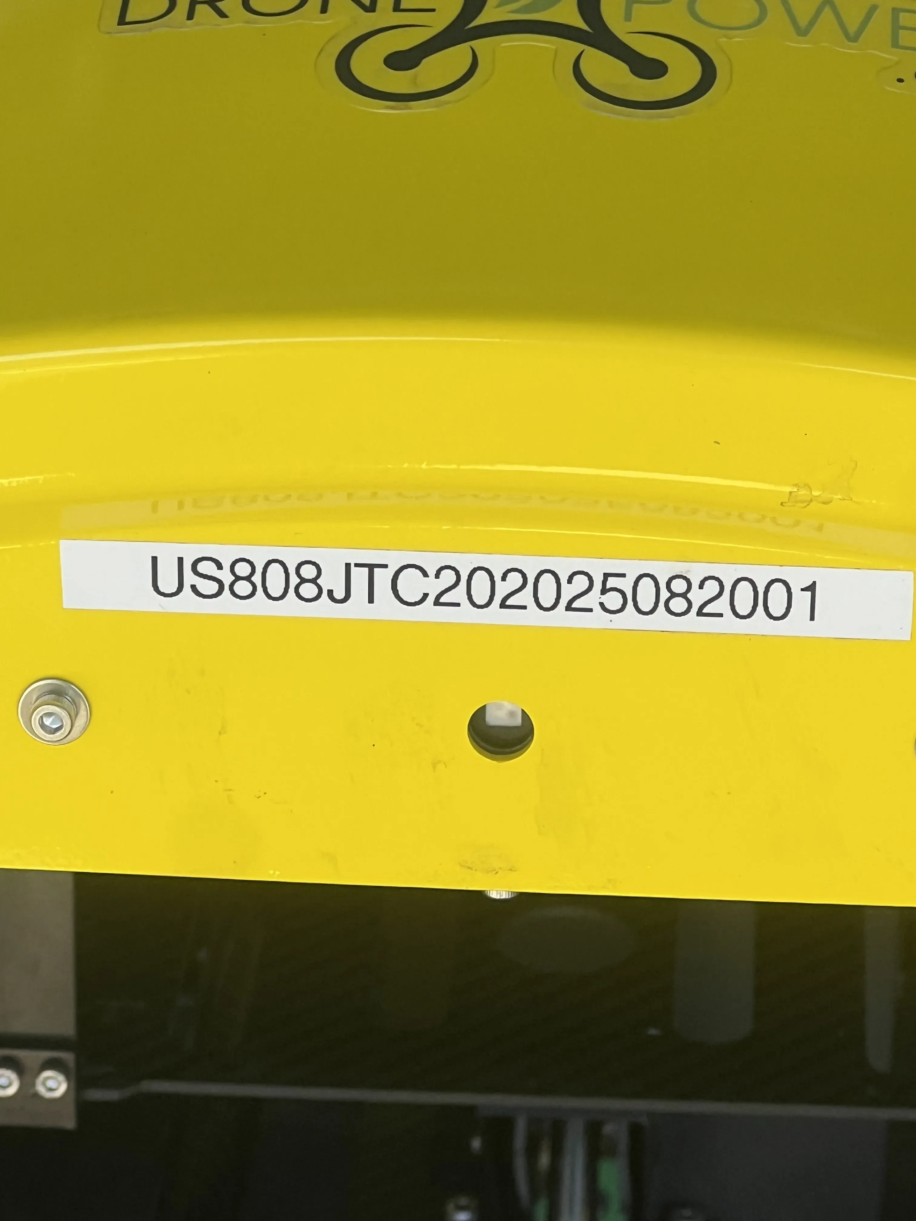 Close-up of a small UAS drone registration card