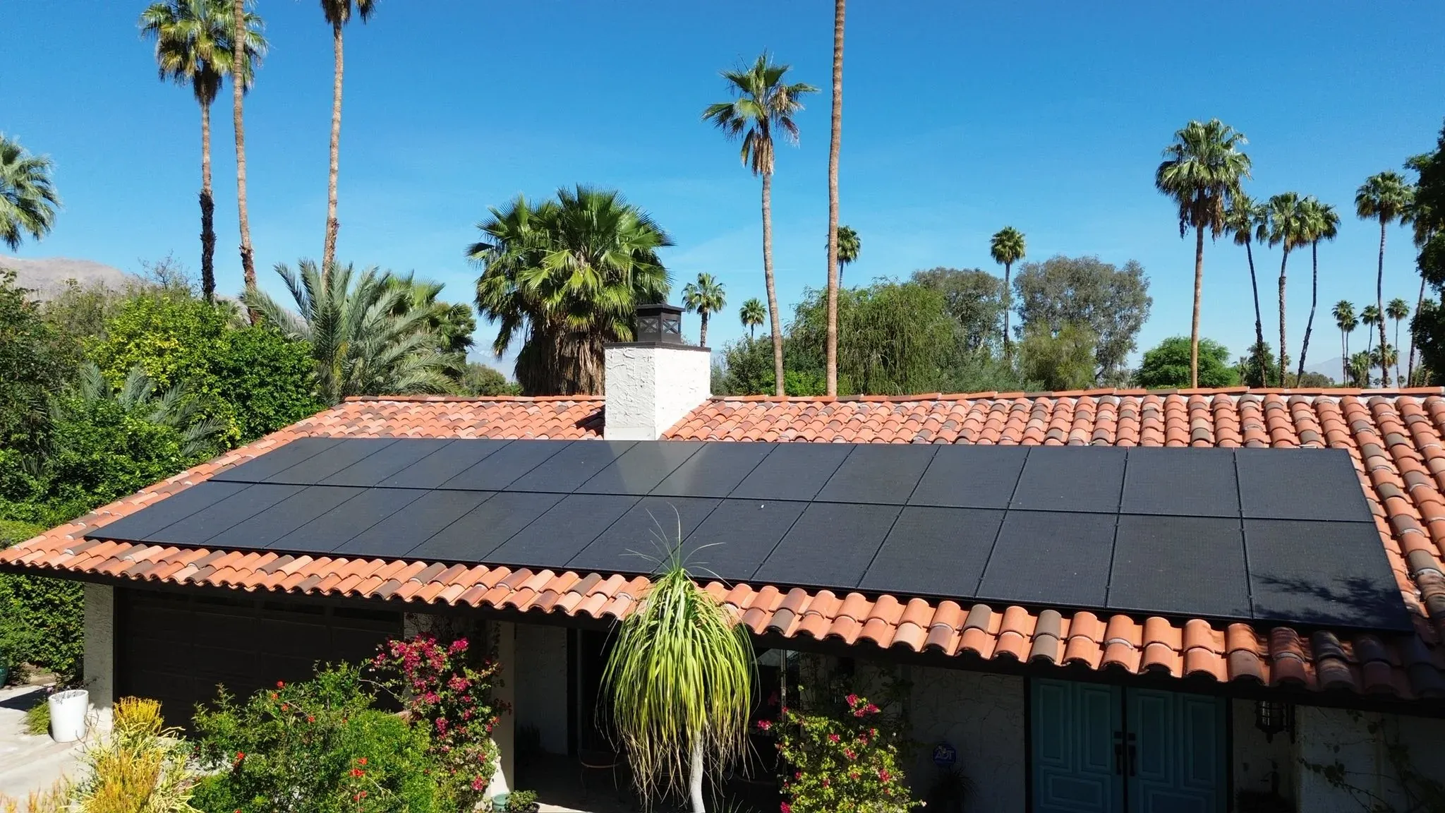 Close-up of Coachella Valley solar panels collecting desert dust between cleanings