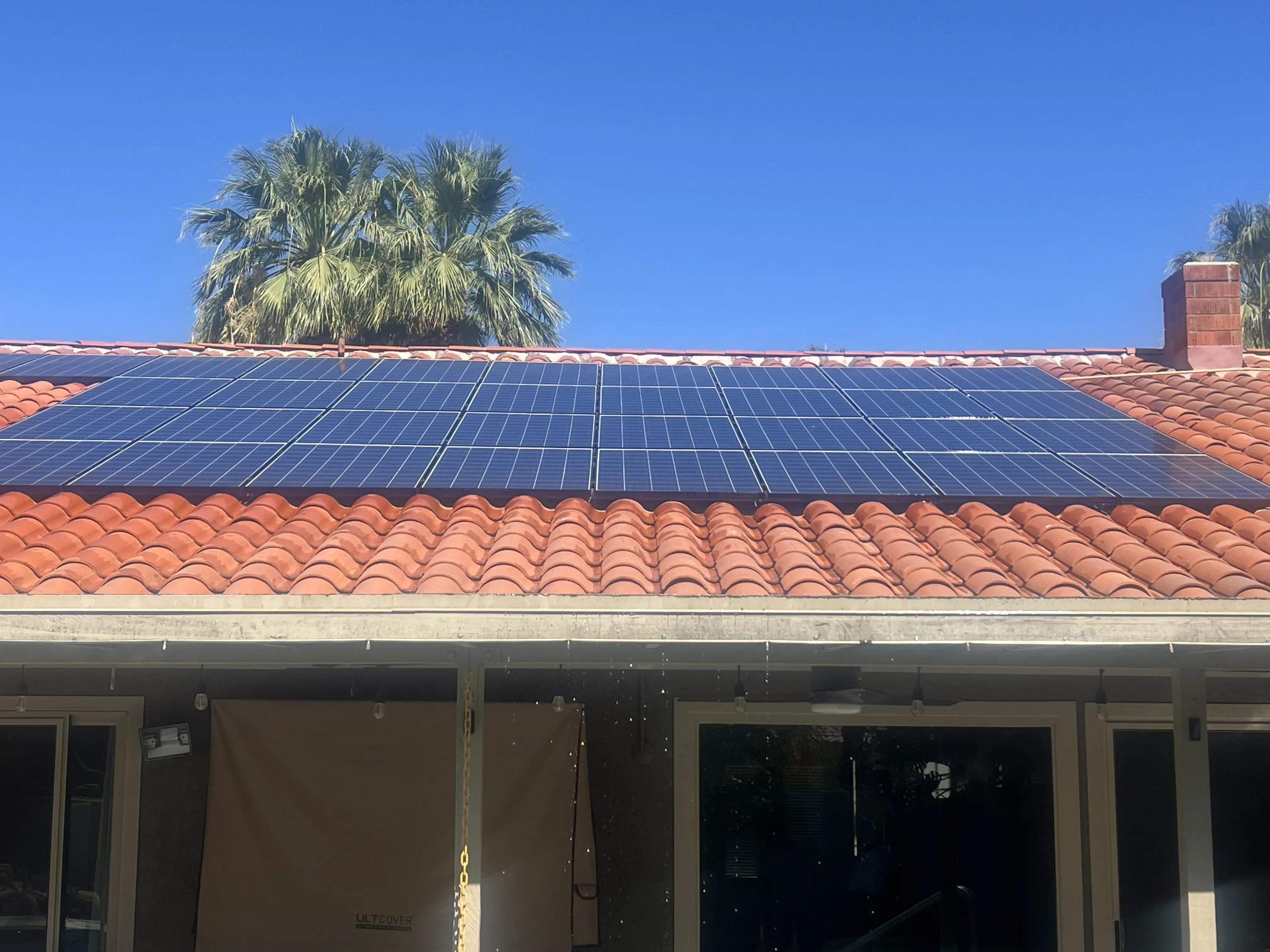 Alternate front-facing view of a home and rooftop solar array