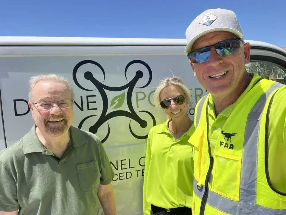 DronePower1 team selfie in front of the branded work van
