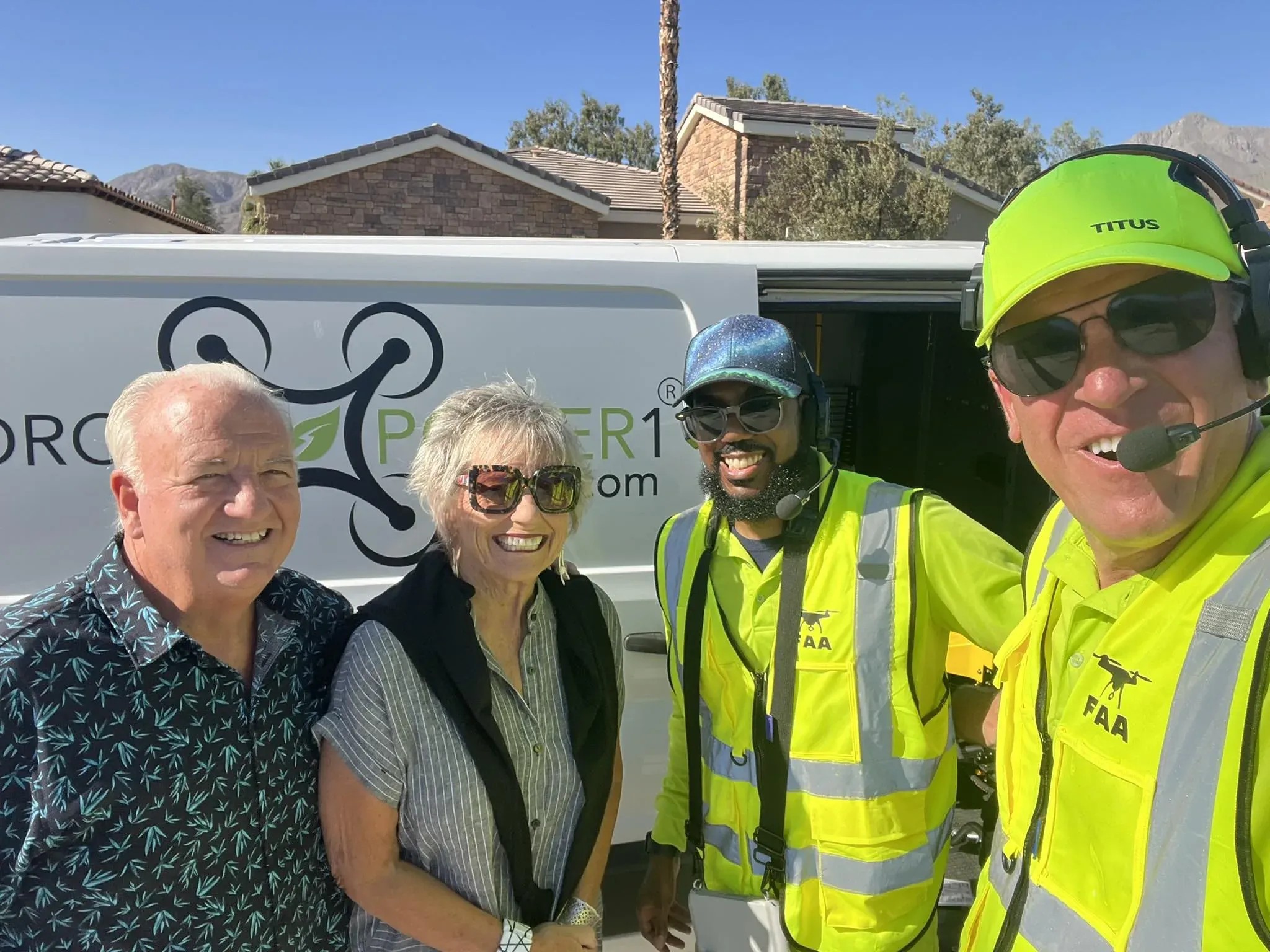 DronePower1 crew selfie with the branded van at the jobsite